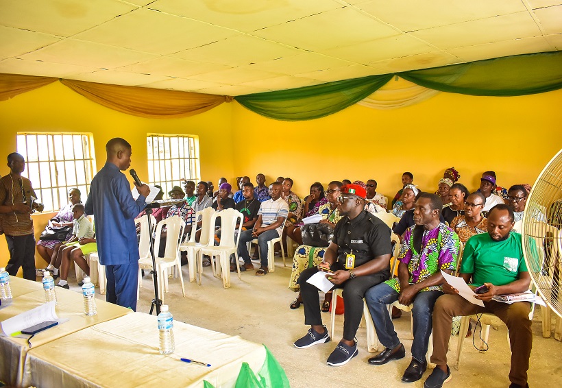 Pst. Edewor Egedegbe presenting a paper during stakeholders meeting in Aileru Primary School, Warri