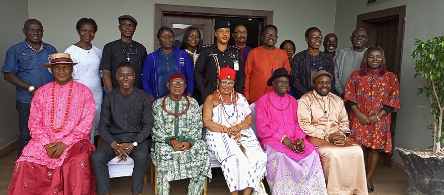 Group photographs with members of PIND Delta Conflict Prevention Council, Asaba